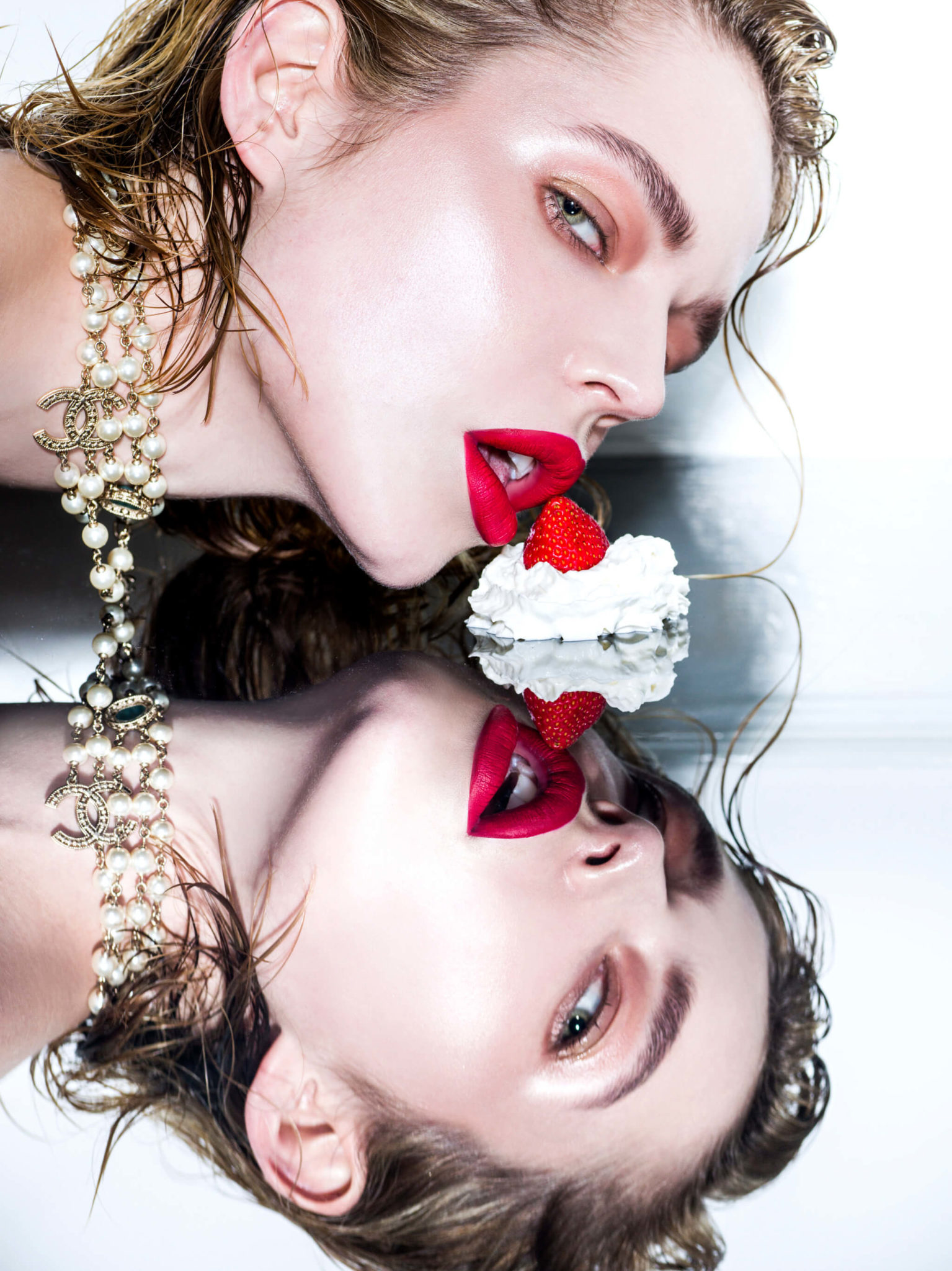 Red Lips and Model eating a strawberry