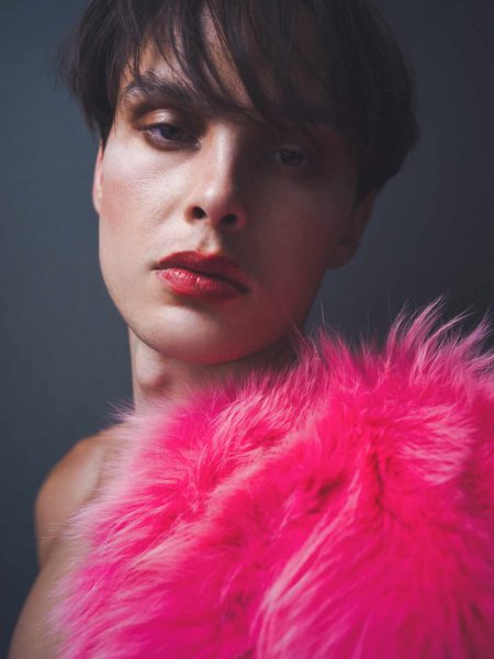 Man with make up and red lips